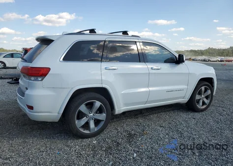 2014 Jeep Grand Cherokee Overland из США, поврежденный, VIN 1C4RJECG8EC211964